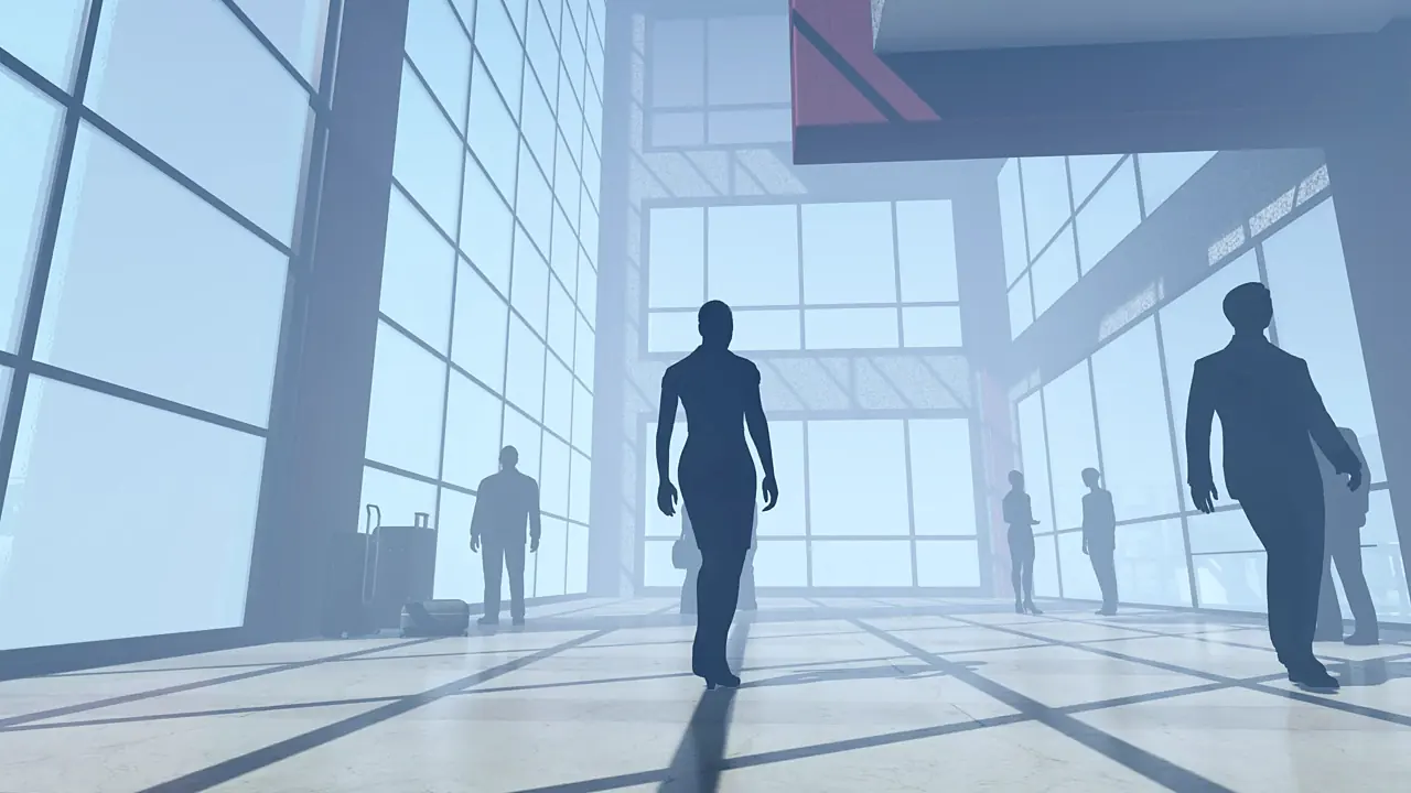Silhouettes of people crossing a bright glass-walled office lobby